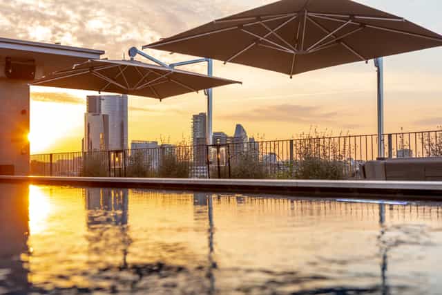 Rooftop terrace at Hotel VIU Milan with skyline backdrop for premium evening networking events.