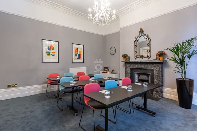 Classroom-style boardroom with historic charm for corporate training and workshops.