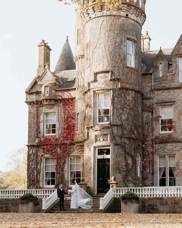 Carlowrie Castle parkland: historic luxury venue for intimate weddings and corporate retreats.