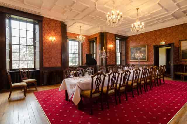 Boardroom dinner at Carberry Tower Mansion: elegant period architecture for formal corporate events.