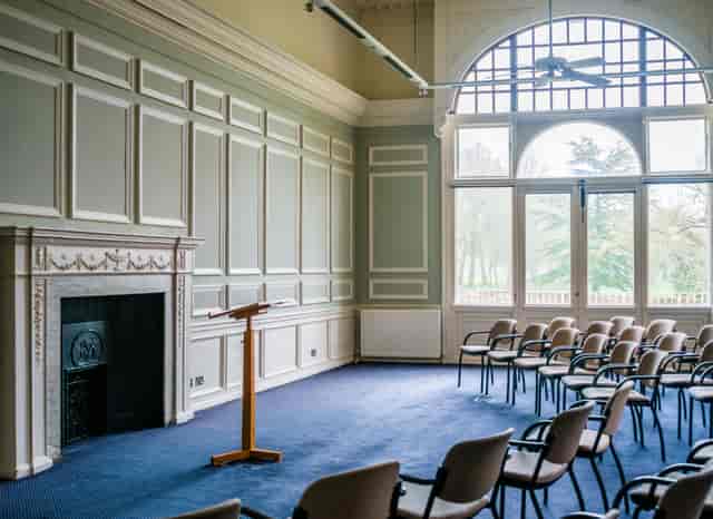 Farnham Castle Great Hall: Historic venue space set for corporate lectures and presentations.