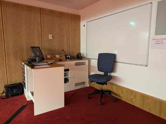 Screening Room G.04 lectern and AV workstation for academic lecture or workshop planning.