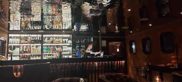 Upscale Ocean Mist lounge with ambient lighting for VIP hospitality and networking events.