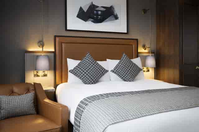 Leo's Restaurant boutique hotel room for VIP speakers and executive corporate events.