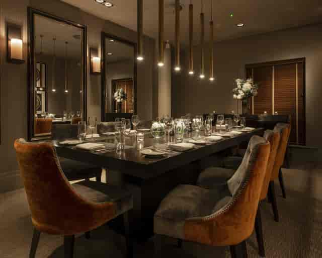 Private dining room at Dakota Edinburgh with plush velvet seating for high-end corporate events.