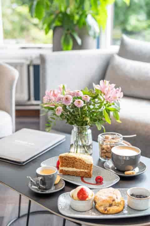 The Brasserie breakout lounge with floral decor for high-end corporate events and conferences.