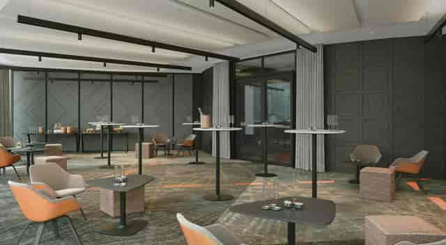 Modern W Edinburgh pre-function space for corporate networking mixers and cocktail receptions.