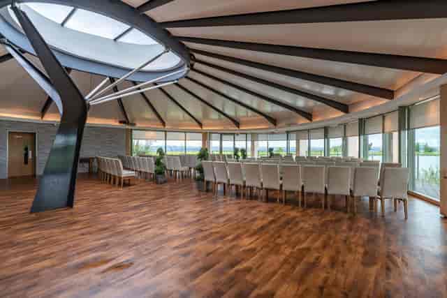 Circular Water Lily suite at The Vu featuring theater seating for corporate events or weddings.