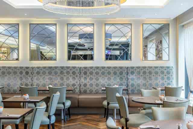Upscale modular meeting room for corporate networking dinners and small events.