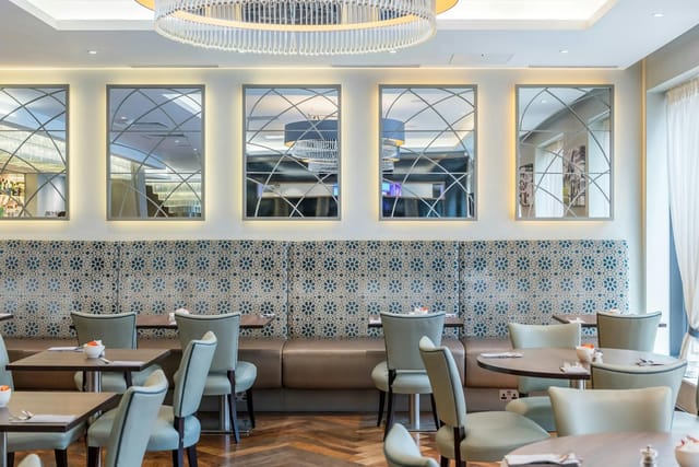 Upscale modular meeting room for corporate networking dinners and small events.
