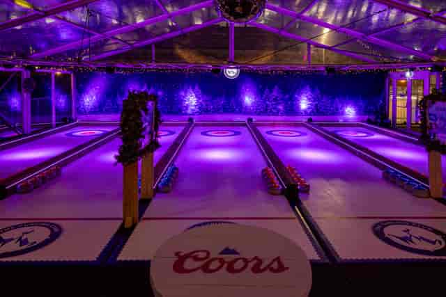 Curling Club pop-up at Vinegar Yard with festive LED lighting for team-building and office events.