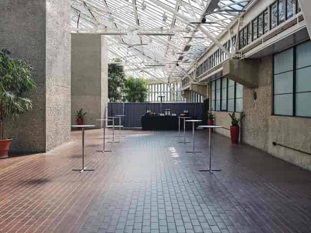 Barbican Conservatory terrace event, high tables, cocktails, networking