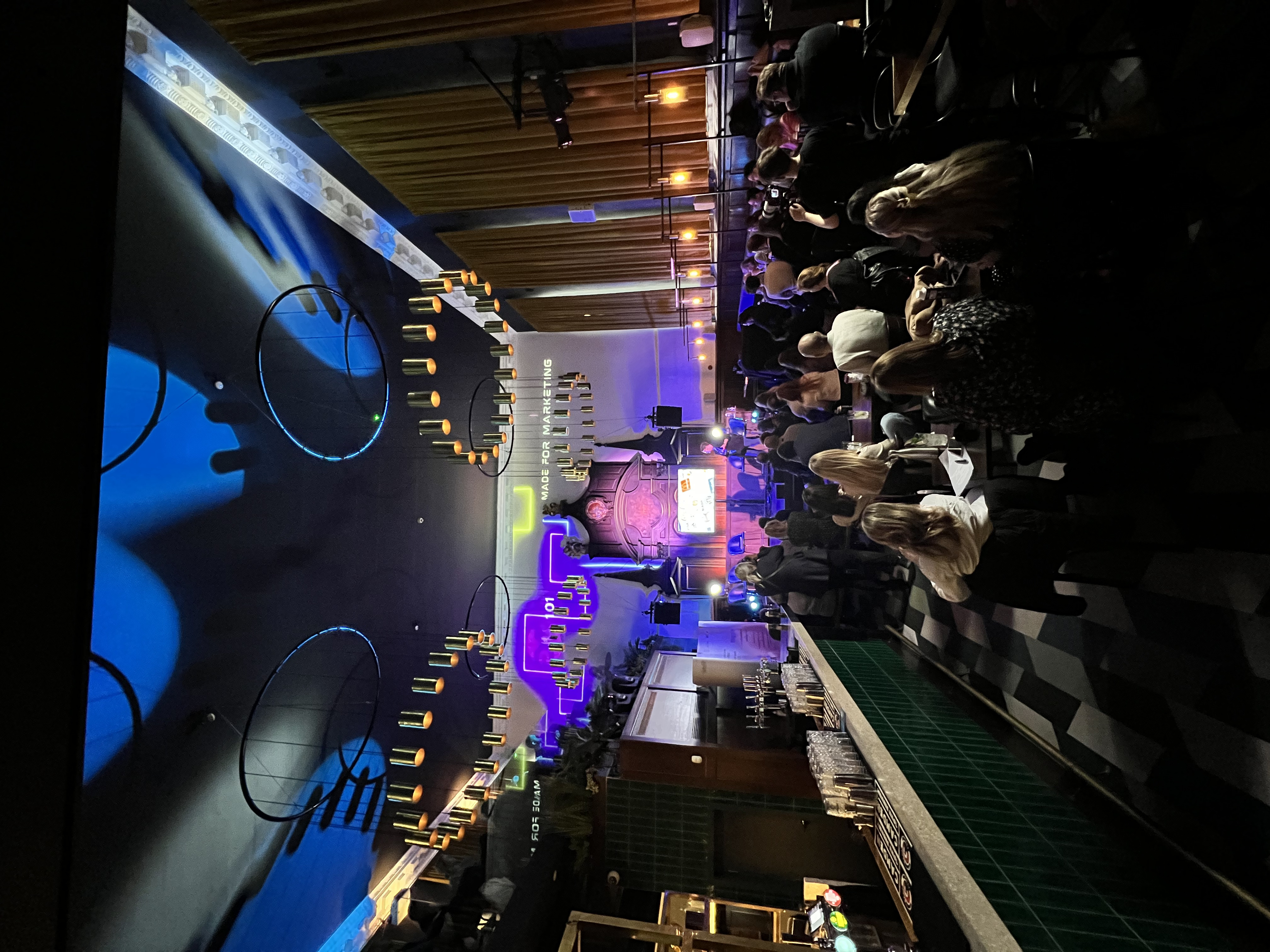 Vibrant event space with stylish bar, ideal for networking and product launches. - Banner
