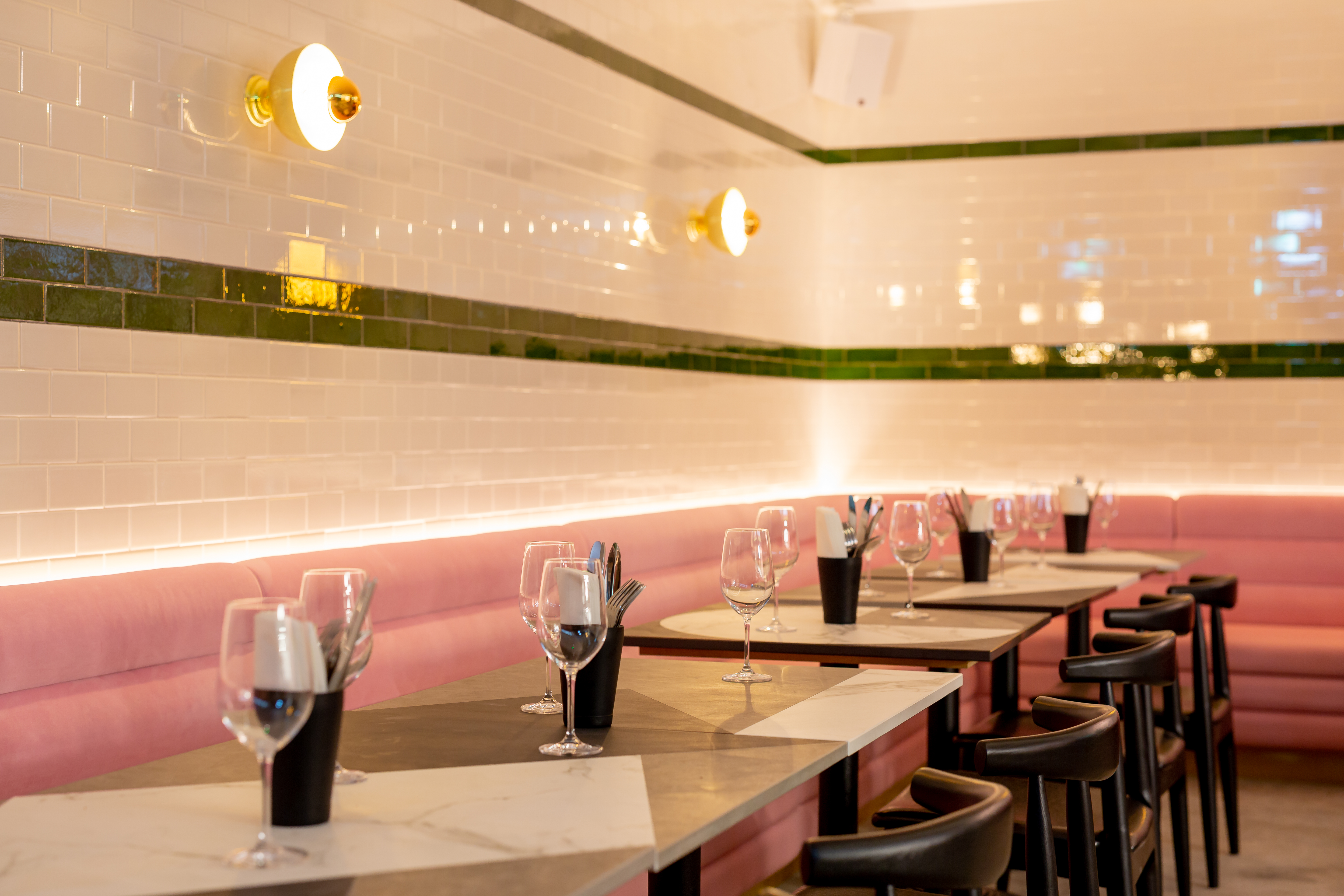 Stylish dining space at The Lounge & Kebab Queen, ideal for meetings and events. - Banner