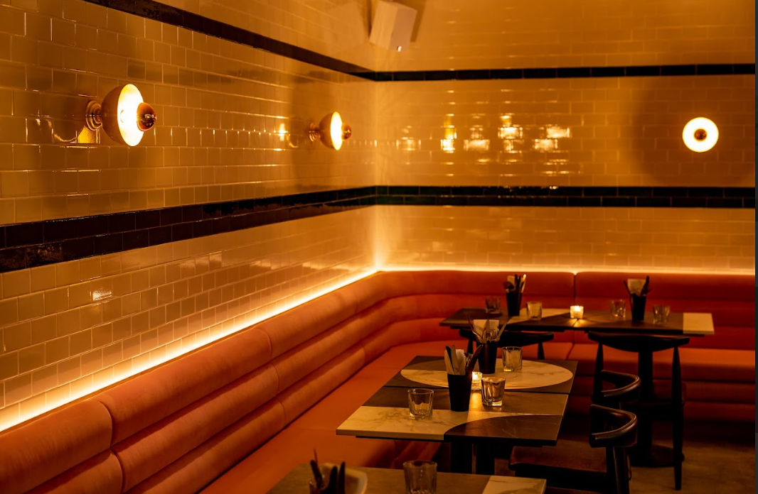 Stylish lounge venue with cozy seating, perfect for intimate gatherings and events. - Banner