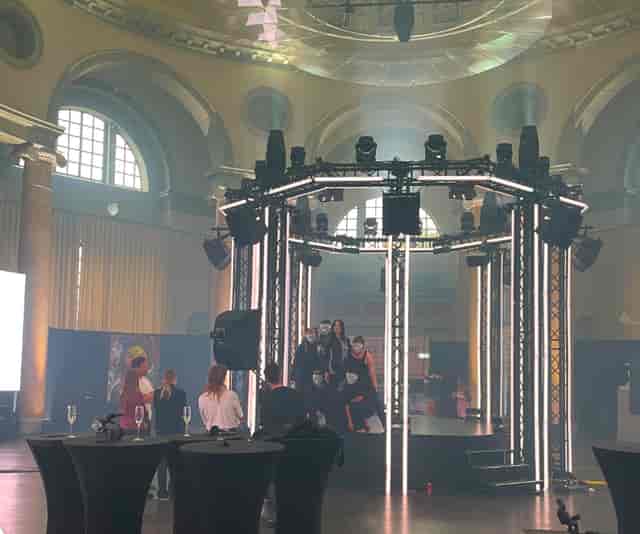 Circular LED stage lighting at a historic Skeppsholmen concert venue for theatrical performance.