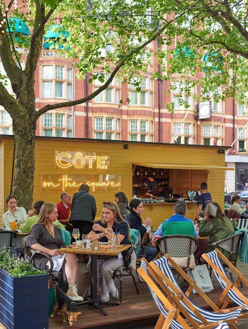 Outdoor wooden pop-up restaurant for summer event activation and brand marketing.
