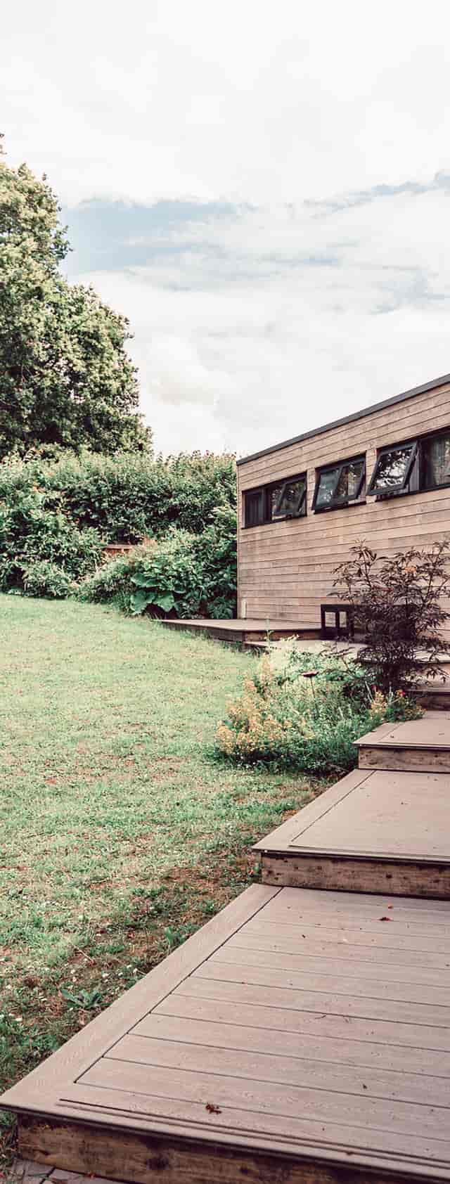 The Hive at Clophill Eco Lodges: minimalist outdoor space for strategy sessions and wellness retreats.