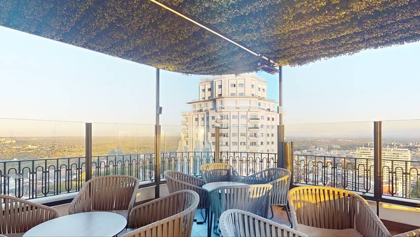 Chic rooftop venue with city views for upscale meetings and events at Hotel Riu Plaza España.
