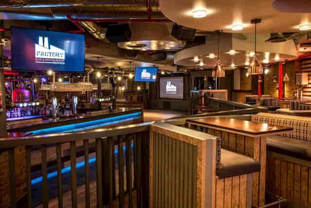 Industrial-chic Factory Bar at Gillingham FC, perfect for corporate networking and product launches.
