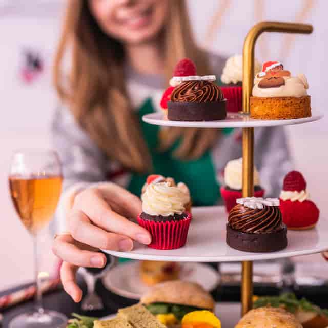 Brigit’s Bakery holiday afternoon tea bus for seasonal networking events.