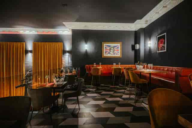 Stylish Mezzanine venue with plush seating for intimate meetings and private events.