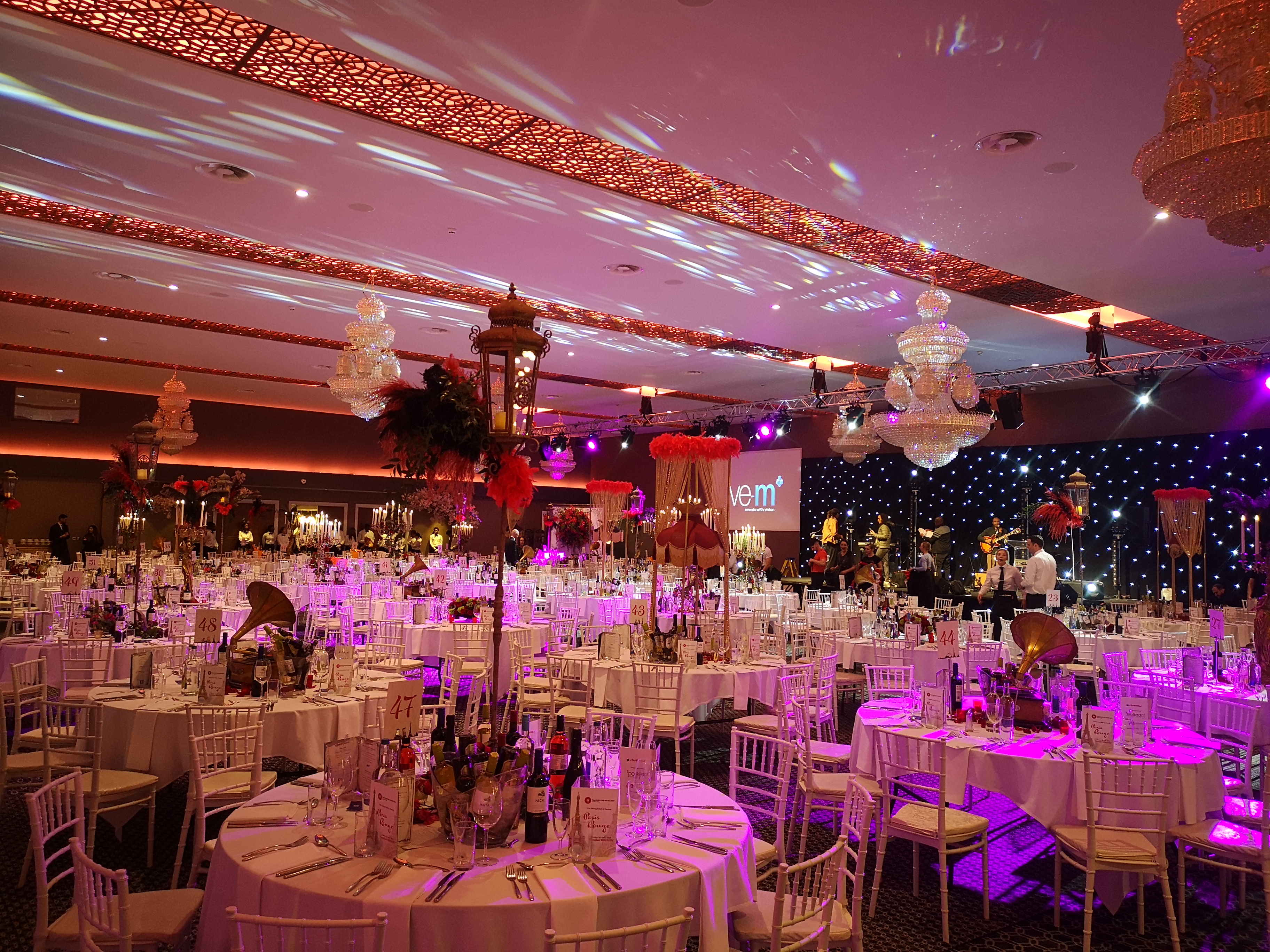 Elegant Grand Suite in Vermilion, ideal for gala events and formal dinners. - Banner