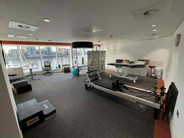 Elite Physios wellness room with floor-to-ceiling river views for corporate retreat and mindfulness.