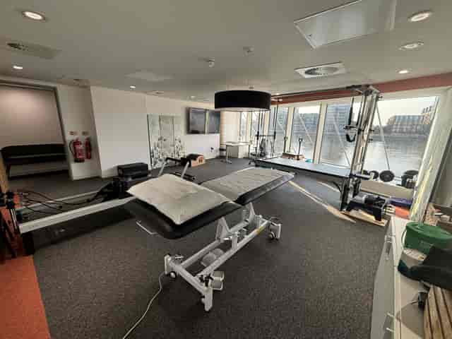 Private wellness studio with waterfront views, ideal for corporate retreats and pilates sessions.