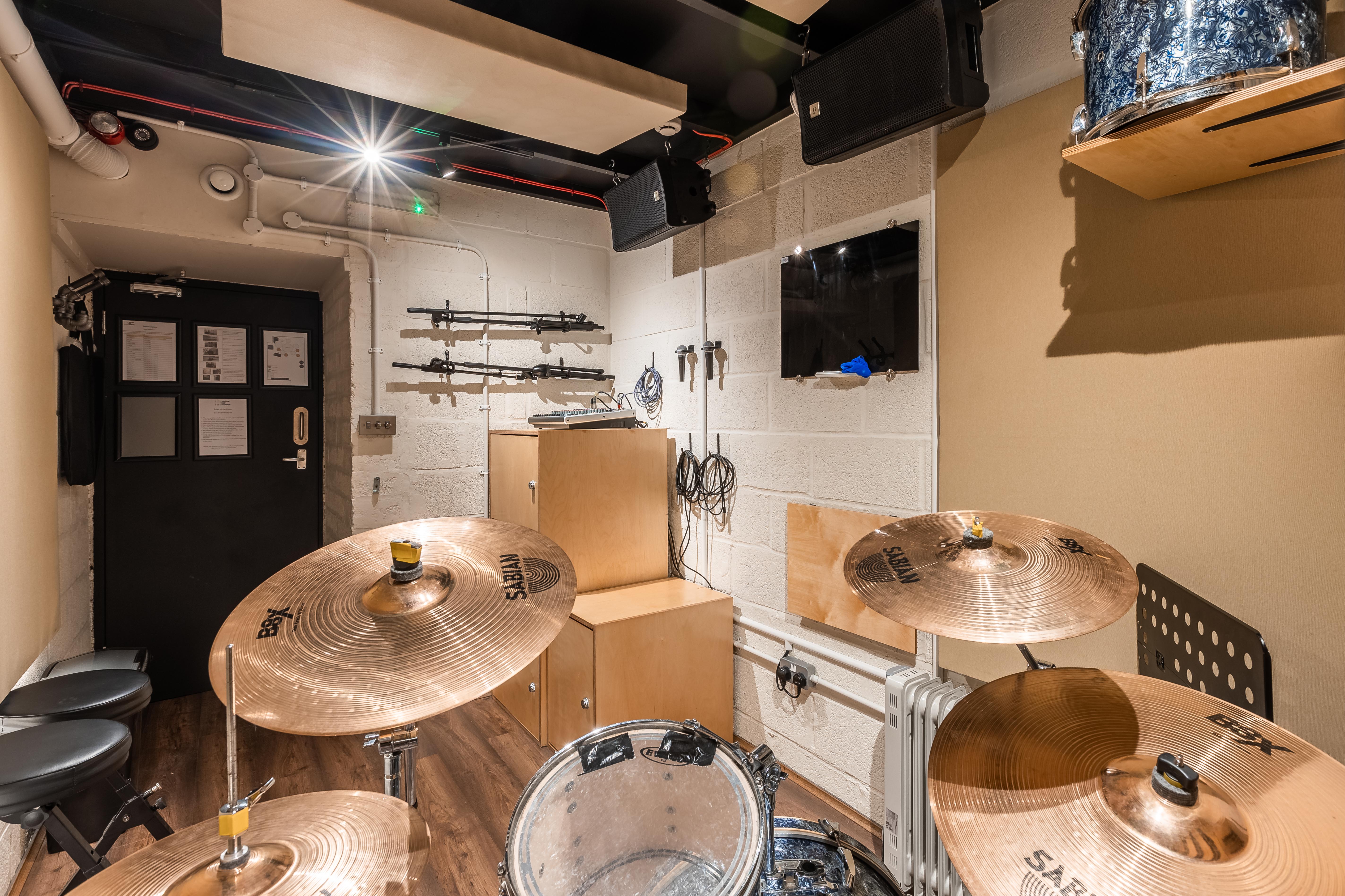 Yellow Hat Studios small rehearsal room for intimate acoustic sessions and creative breakout work.