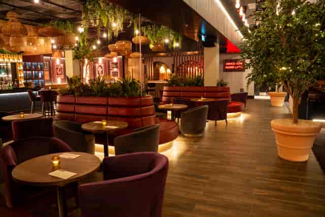 Stylish event space at Hideaway, Co-op Live with cozy seating and natural decor.