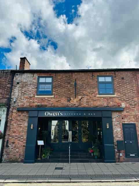 Hale in Owen's Kitchen & Bar: charming brick exterior for team social or off-site dinner events.
