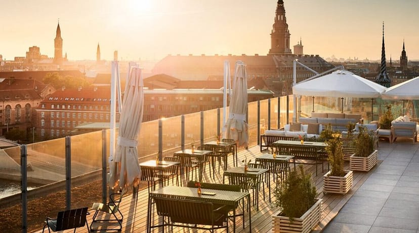 Rox Resort rooftop terrace with versatile seating for sunset networking events and cocktails.