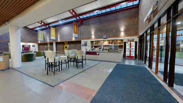 Foyer at Yarnfield Park training venue for professional networking and conference registration.