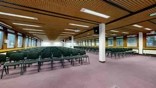 Victory Suite conference room with theater seating, ideal for professional meetings and events.