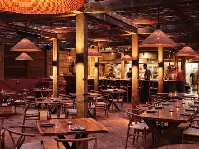 "Cozy Pyro Restaurant with rustic decor for intimate events and networking."