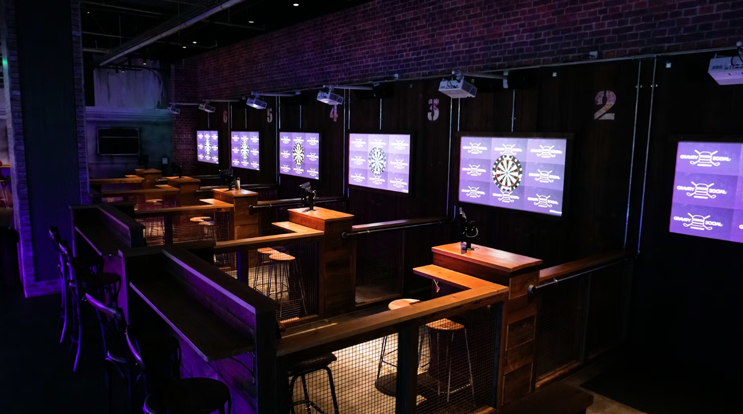 "Gravity Wandsworth event space with interactive stations, ideal for team-building and networking." - Banner