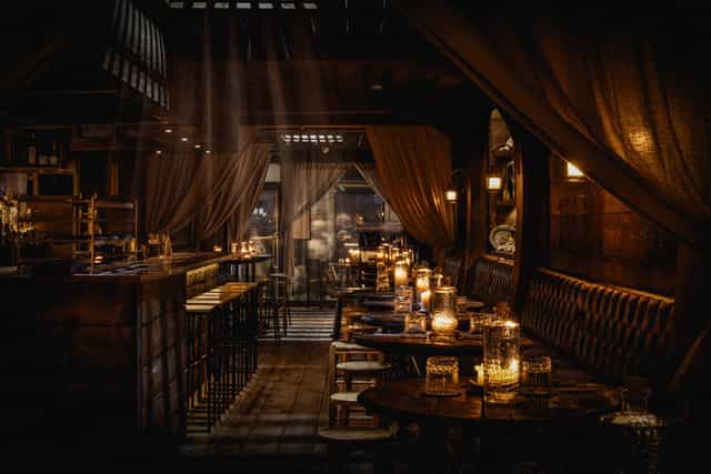 Rhum Tavern cocktail bar with moody lighting for VIP receptions and networking events.