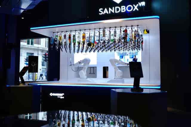 Robotic bar at Sandbox VR London: high-tech experiential event venue for futuristic activations.