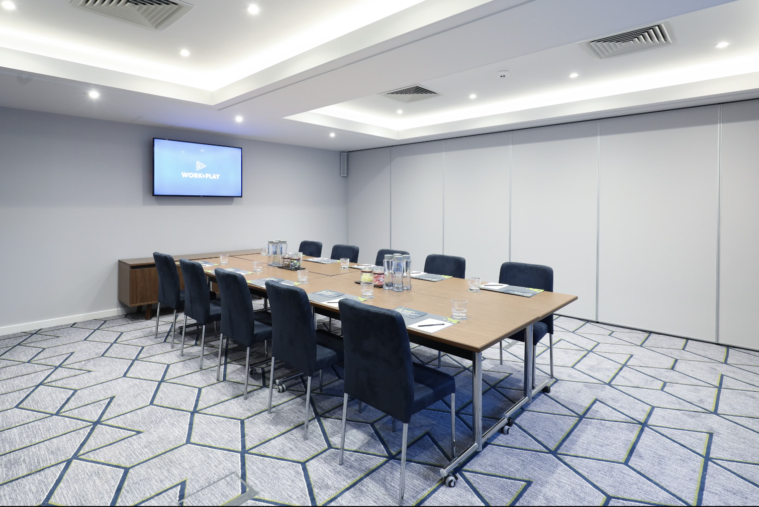 Boardroom setup at Malmaison Brighton for small corporate meetings and business conferences.