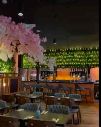 Floral-themed bar at Kerala Canteen for networking receptions and product launches.