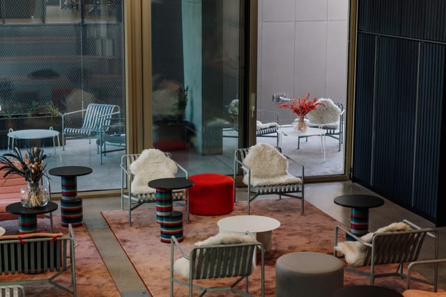 Forum Design District: Chic lounge seating for corporate retreats and networking events.
