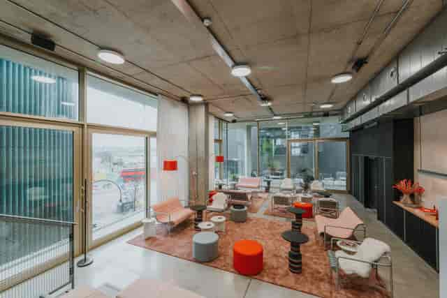 Modern breakout space with modular seating for networking and VIP corporate events.