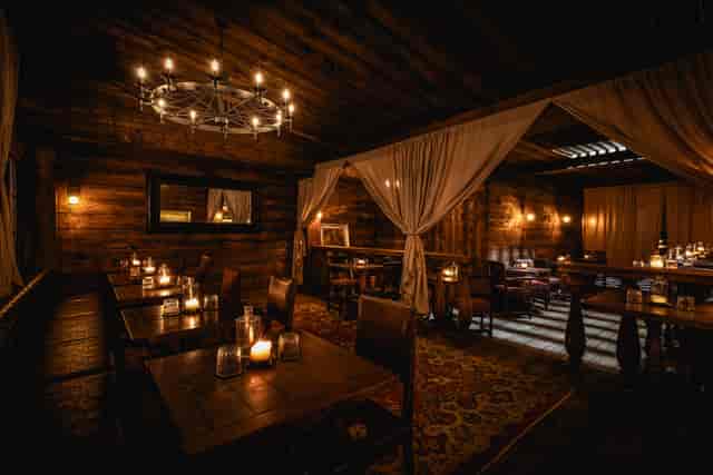 Captain's Quarters at Rhum Tavern: rustic wood venue for upscale private dinners and VIP events.