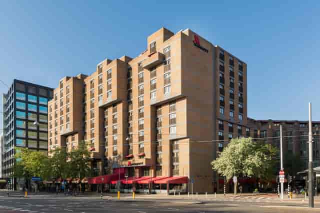 Modern Amsterdam Marriott Hotel meeting space with ample natural light for events.