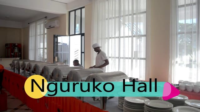 Buffet setup with chafing dishes at Nguruko Hall for corporate events and wedding catering.