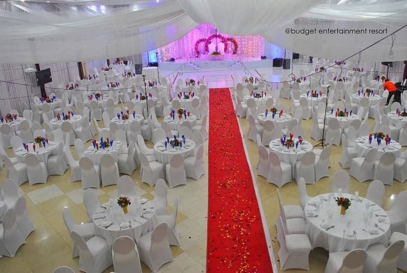 Urafiki Social Hall: Ballroom with ceiling draping for gala or wedding reception events.