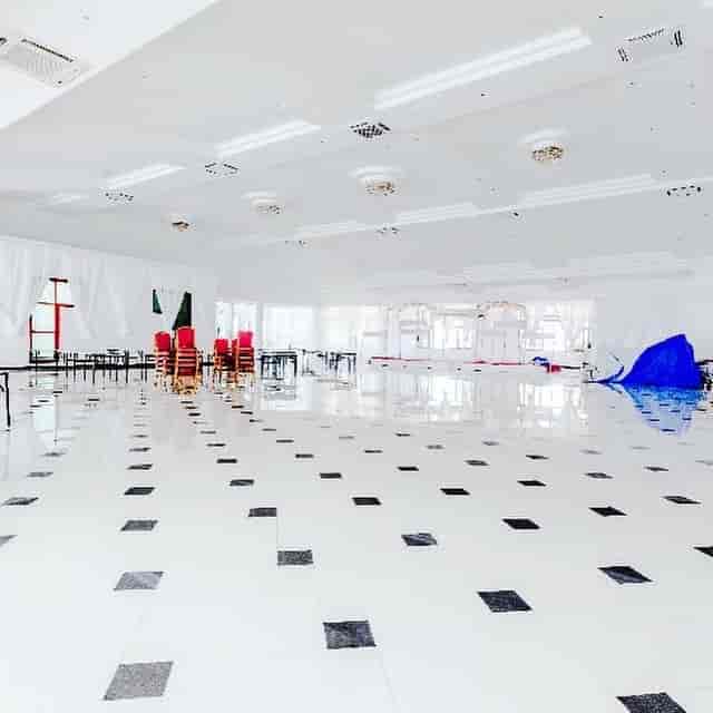 Urafiki Social Hall banquet space featuring high-gloss floors for wedding or corporate event setup.