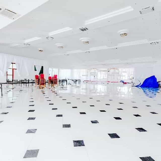 Urafiki Social Hall banquet space featuring high-gloss floors for wedding or corporate event setup.