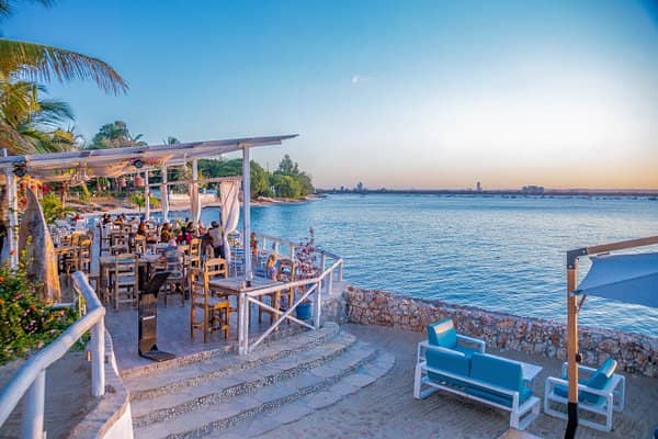 Waterfront Kukurico Restaurant for corporate incentive dinners and networking events at sunset.